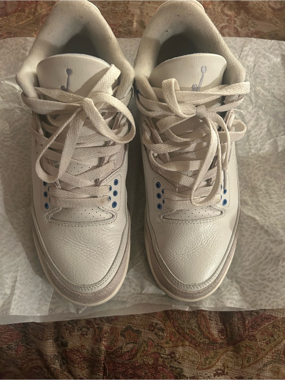 Jordan White Sneakers with Blue Eyelet Accents